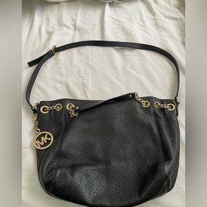 Michael Kors black leather bucket  purse.